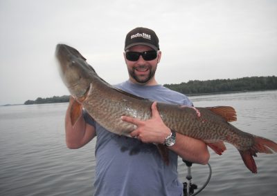 Muskie charter Image of fish with person17